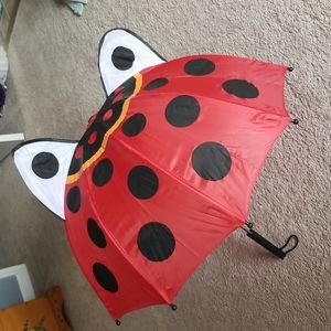 Kid sized ladybug umbrella